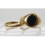 A 9ct gold bloodstone agate signet ring size K1/2, and a 9ct wedding ring size L1/2, weight combined