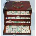 A cased Mah Jong set Condition Report: Available upon request