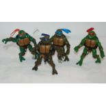 A collection of loose action figures including Ninja Turtles, Star Wars etc Condition Report: