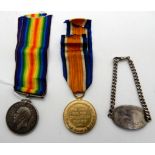 A WWI war medal, victory medal to 46005 Pte Wm. C. Breckenridge, Royal Scots and his wrist tag