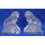 A pair of frosted and clear glass ram bookends, 17cm high Condition Report: