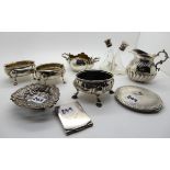 A lot comprising a pair of silver salts, a single salt, a cream jug, an 800 silver sugar bowl, a bon