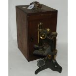 A brass microscope by Baker, London (def) in case Condition Report: Available upon request