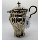 A continental white metal pot and cover, the balluster body with spiral fluting, 15cm high Condition