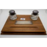 An oak and EP double inkstand with silver plaque, Birmingham 1965, 29cm x 20cm Condition Report: