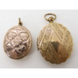 Two yellow metal engraved lockets weight together 21gms Condition Report: Available upon request