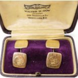 A pair of 10k gold monogrammed cufflinks, weight 4.3gms Condition Report: Available upon request