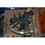 A cased sextant (def) and brass microscope (def) (2) Condition Report: Available upon request