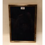 A silver mounted photo frame, London marks, 39.8cm x 28.8cm aperture 36.2cm x 25.5cm inscribed "