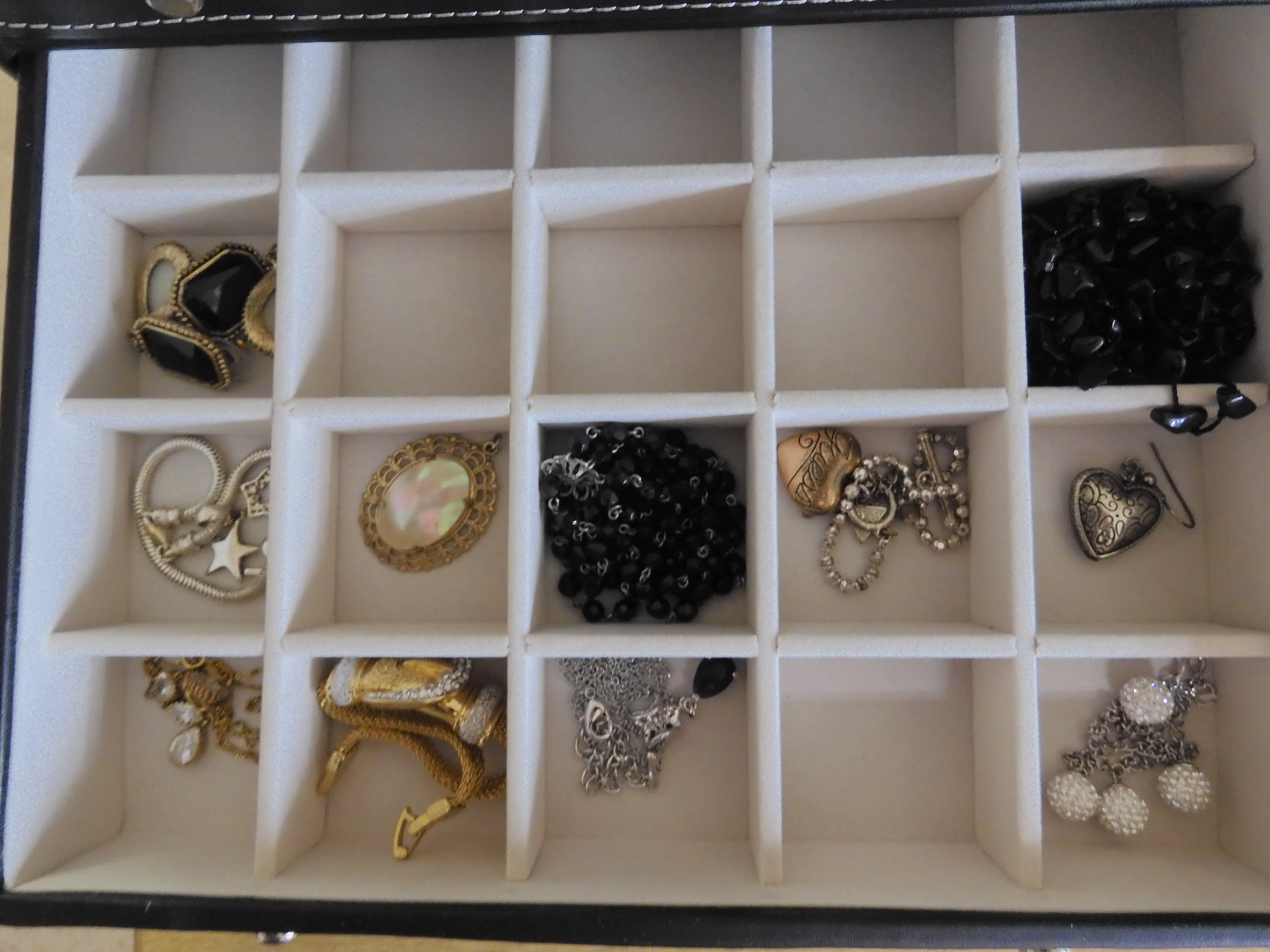 A large jewellery box full of silver and costume jewellery, to include a large gem set panda pendant - Image 4 of 6