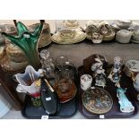 An assortment of cut glass and crystal, including coloured vases, glasses, a clock, ceramic figures,