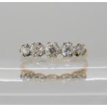 An 18ct gold five stone diamond ring set with estimated approx 0.40cts of old cut diamonds, finger