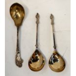 A lot comprising a pair of silver plated apostle serving spoons an another serving spoon Condition