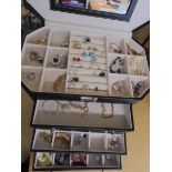 A large jewellery box full of silver and costume jewellery, to include a large gem set panda pendant