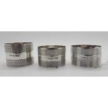 A lot comprising a pair of silver napkin rings, Birmingham 1945 and a single (3), 79gms Condition