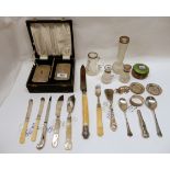 A cased silver brush and comb set, Birmingham 1959, with a box of assorted silver handled knives,