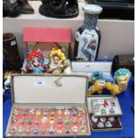 Assorted hand painted pottery Japanese masks, a fo dog, a porcelain vase etc Condition Report: