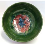 A Moorcroft Anemone pattern bowl, 16cm diameter Condition Report: Available upon request