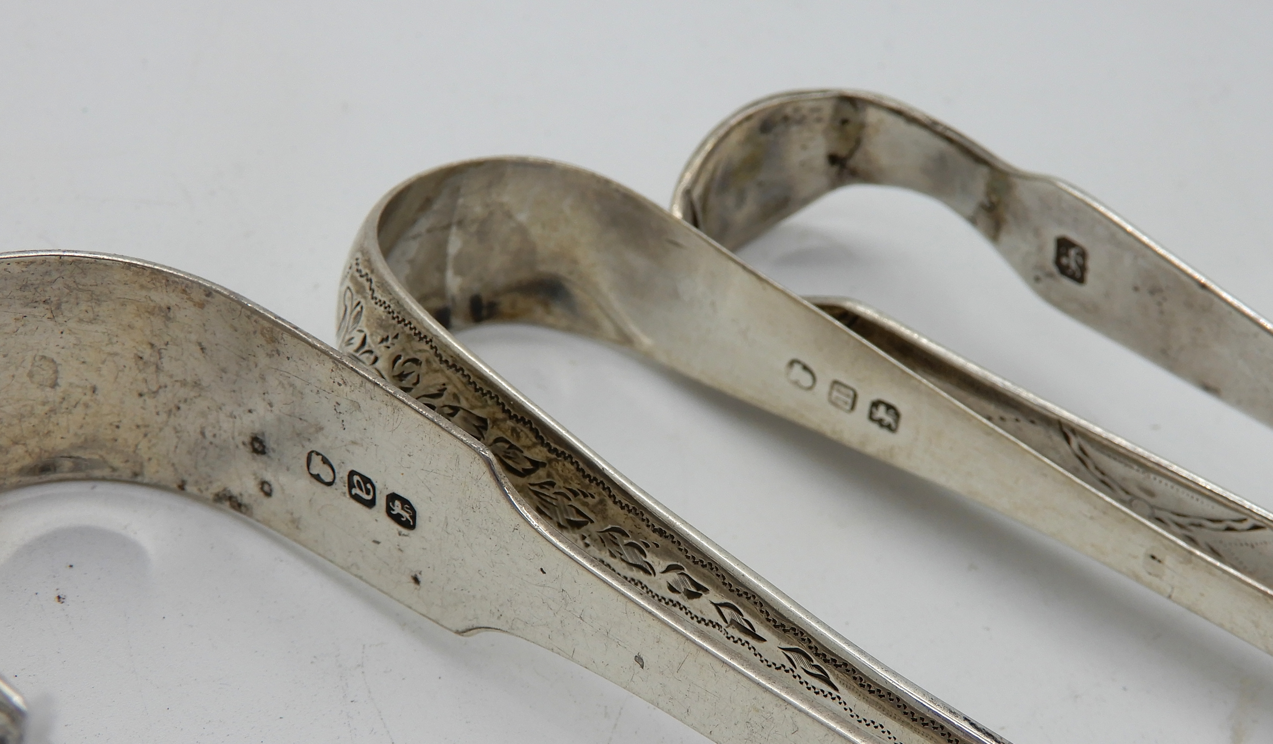 A lot comprising six pairs of assorted silver sugar tongs, 201gms Condition Report: Available upon - Image 3 of 4