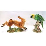 A Beswick model of a Hare, no 1024 and a model of a Parrot, no 930 Condition Report: Available