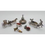 A continental silver figure of a hare drawing a wheelbarrow with a cockerel with import marks for