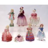 Seven Royal Doulton figures including Rose, The Little Bridesmaid, Dorcus, Springtime, Polly Curtsy,