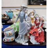 Four Royal Doulton figures including Top o The Hill, Valerie, Autumn Breezes, and Sandra, a Poole
