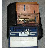 A brass cased student microscope other cased instruments etc Condition Report: Available upon