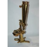 A vintage brass microscope by Ross, London, no case, cased theodolite Condition Report: Available