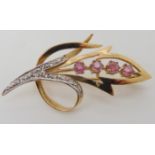 A 9ct gold ruby and diamond brooch length 4.5cm, weight 3.7gms Condition Report: Available upon