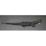 An taxidermy model of a crocodile, 120cm long (def) Condition Report: Available upon request