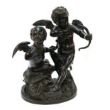 A cast bronze of two cherubs, 29cm high Condition Report: Available upon request