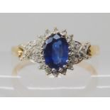 A 9ct gold sapphire and diamond cluster ring, size T1/2, weight 3.4gms Condition Report: Available