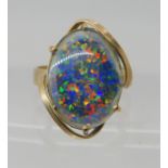 A 9ct gold opal triplet set ring, size N1/2, weight 3.9gms Condition Report: Available upon request