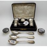 A lot comprising a cased five piece silver condiment set, two Aberdeen silver teaspoon, a white