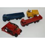 Eleven various vintage Dinky models including Foden flatbed trucks, Muir-Hill Dumper etc and small