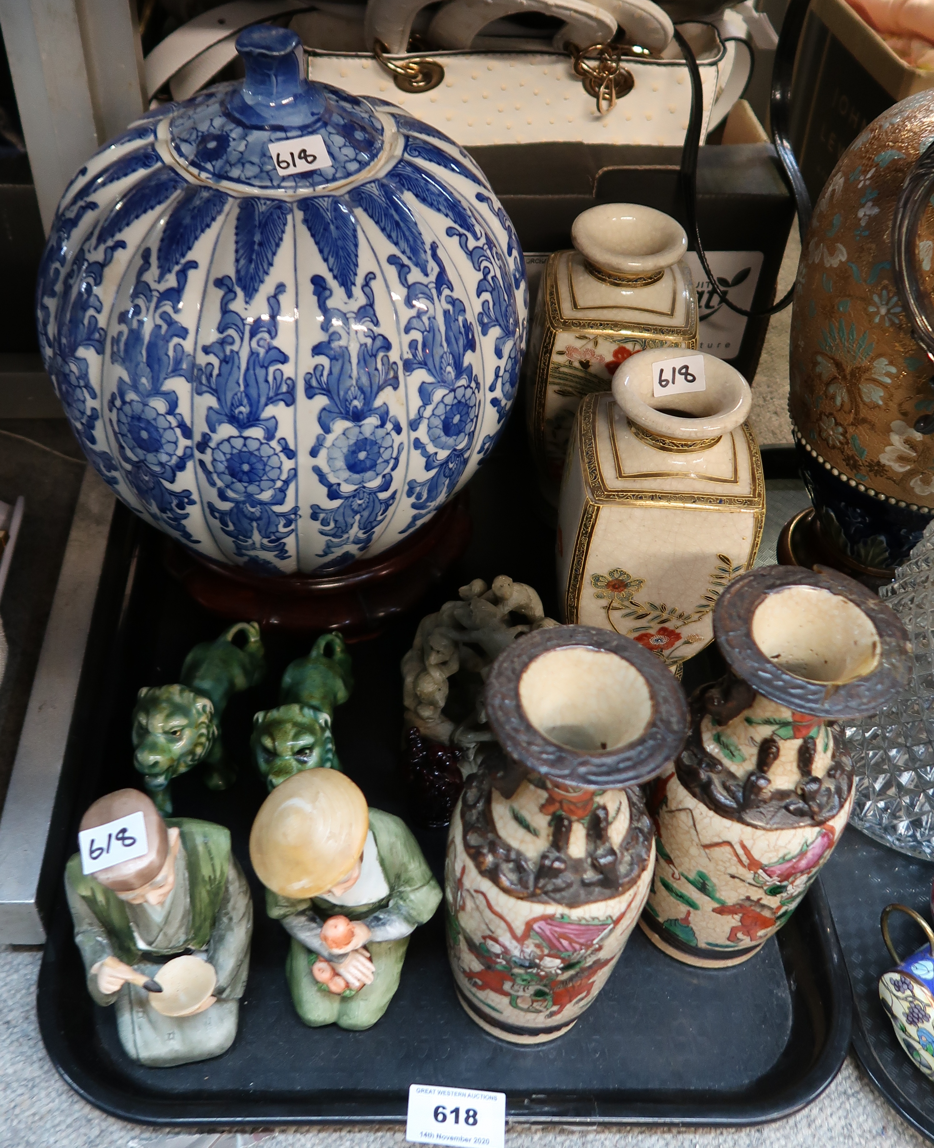 A lot comprising various Asian ceramics, including a pumpkin shaped pot, a pair of lion figures,