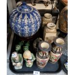 A lot comprising various Asian ceramics, including a pumpkin shaped pot, a pair of lion figures,