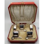 A cased five piece silver condiment set, Birmingham 1934 Condition Report: Available upon request