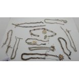 A lot comprising nine silver watch chains, three with medal fobs and an unmarked chain, 466gms (