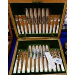 A cased twenty four piece EP and mother of pearl fruit cutlery set Condition Report: Available