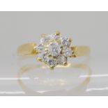 An 18ct gold diamond flower ring set with estimated approx 0.20cts, finger size H1/2, weight 1.