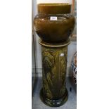 A ceramic jardiniere and stand, the base with incised decoration Condition Report: Available upon