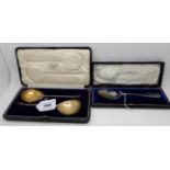 A lot comprising a cased pair of silver seal-top serving spoons, Sheffield 1925 and a cased