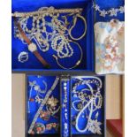 A jewellery box full of vintage costume jewellery to include a Miracle brooch and String of Honora