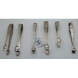 A lot comprising six pairs of assorted silver sugar tongs, 201gms Condition Report: Available upon