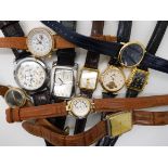 A collection of modern wristwatches to include examples by Rofina, Garuda and an exhibition back