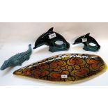 A Poole pottery dish, two models of dolphin and a crocodile Condition Report: Available upon