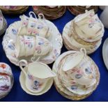 A Radfords tulip decorated teaset, pattern no 7433, comprising ten cup, twelve saucers and plates,