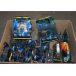 A collection of Doctor Who figures in original blister packs, Star Wars Darth Vader costume and